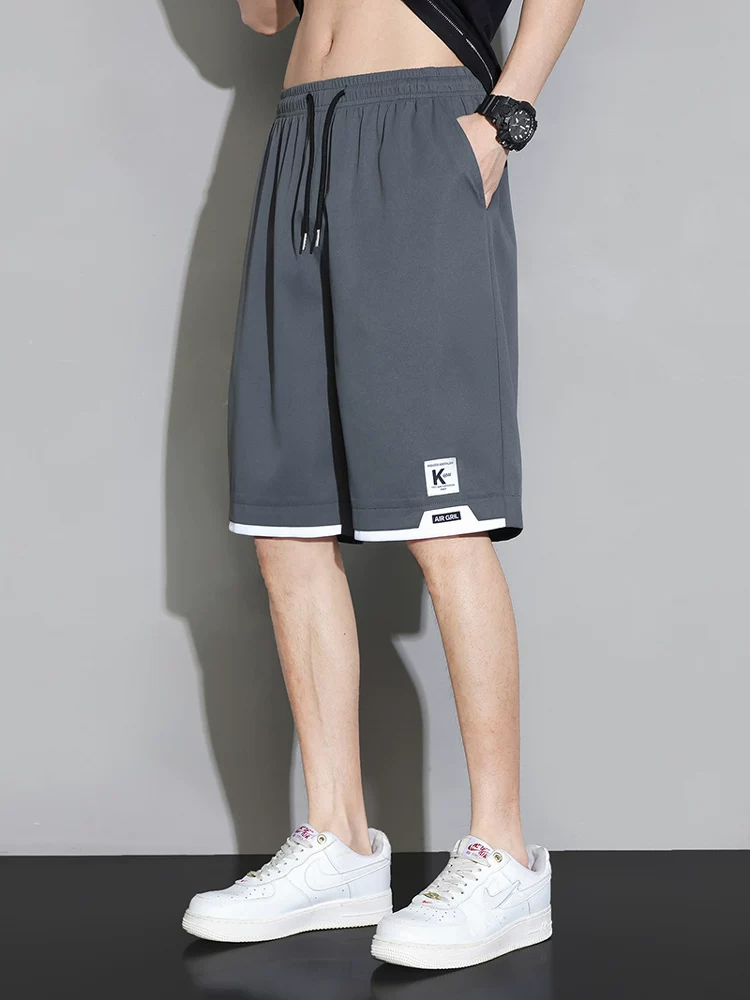 Quần short nhanh khô chất liệu lụa băng Jeanswest dành cho nam, quần năm phần mỏng thoáng mát mùa hè, quần dài vừa phải rộng rãi đa năng dành cho học sinh.