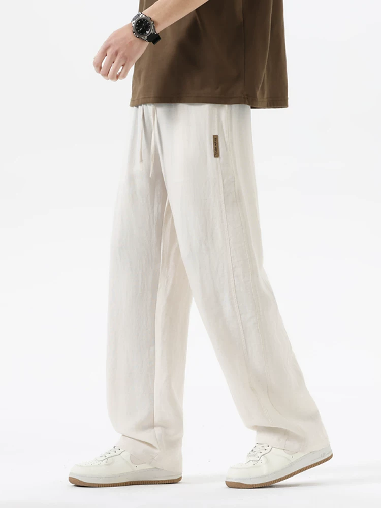 Quần dài ống rộng kiểu Mỹ của Jeanswest dành cho nam, mùa xuân thu, quần dài ống rộng có dây rút, quần dài thương hiệu thời trang cao cấp.
