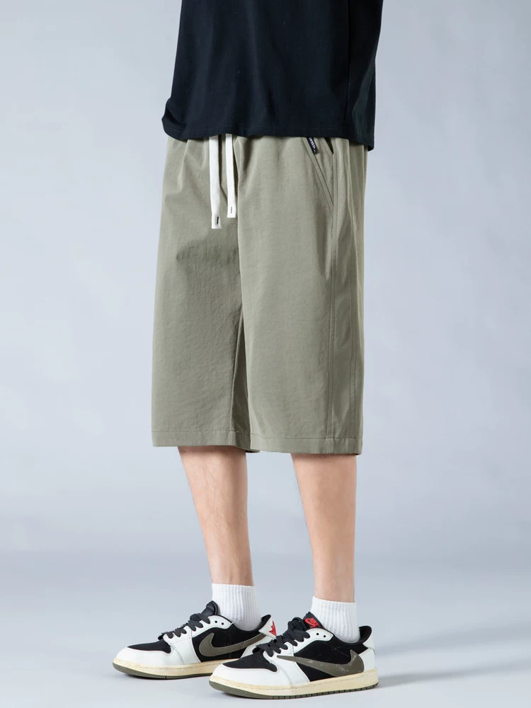 Quần short đa năng hợp thời trang Jeanswest Ice Silk Thin dành cho nam, quần dài bảy phần tư rộng rãi, thoáng khí, nhanh khô, phong cách thường ngày mùa hè.