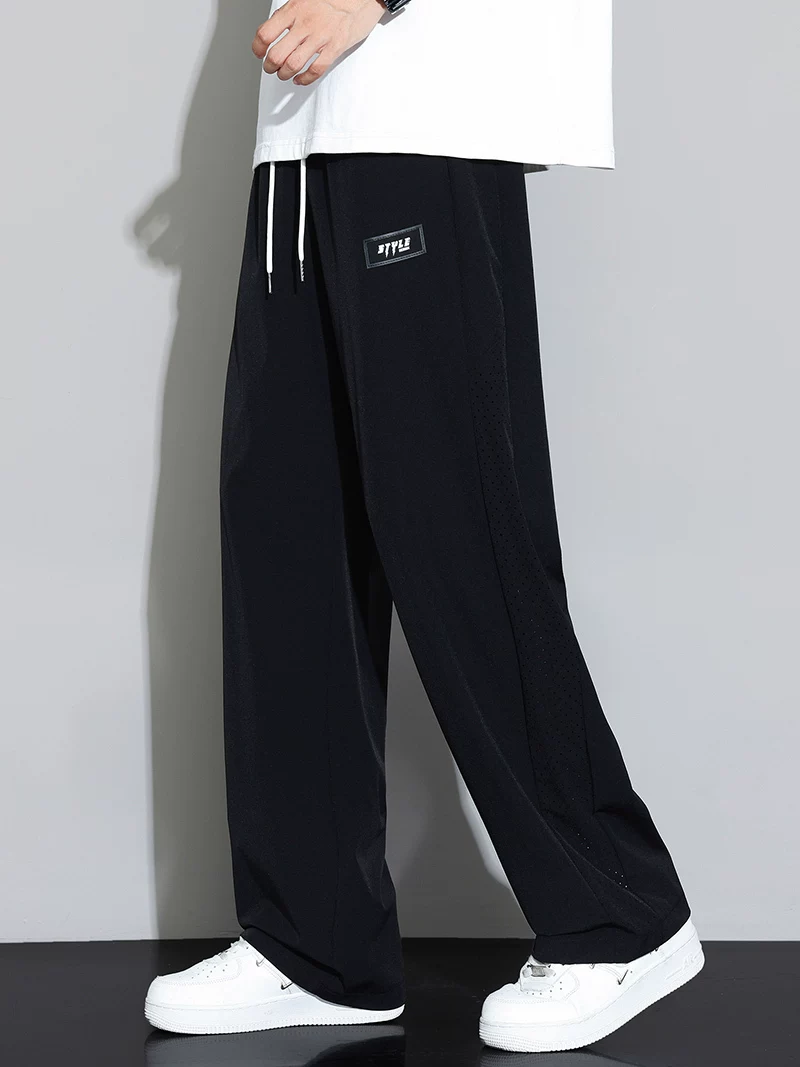 Quần dài vải lưới lụa băng Jeanswest dành cho nam, quần ống rộng dáng suông, chất liệu mềm mại, đa năng, phong cách thường ngày mùa hè.