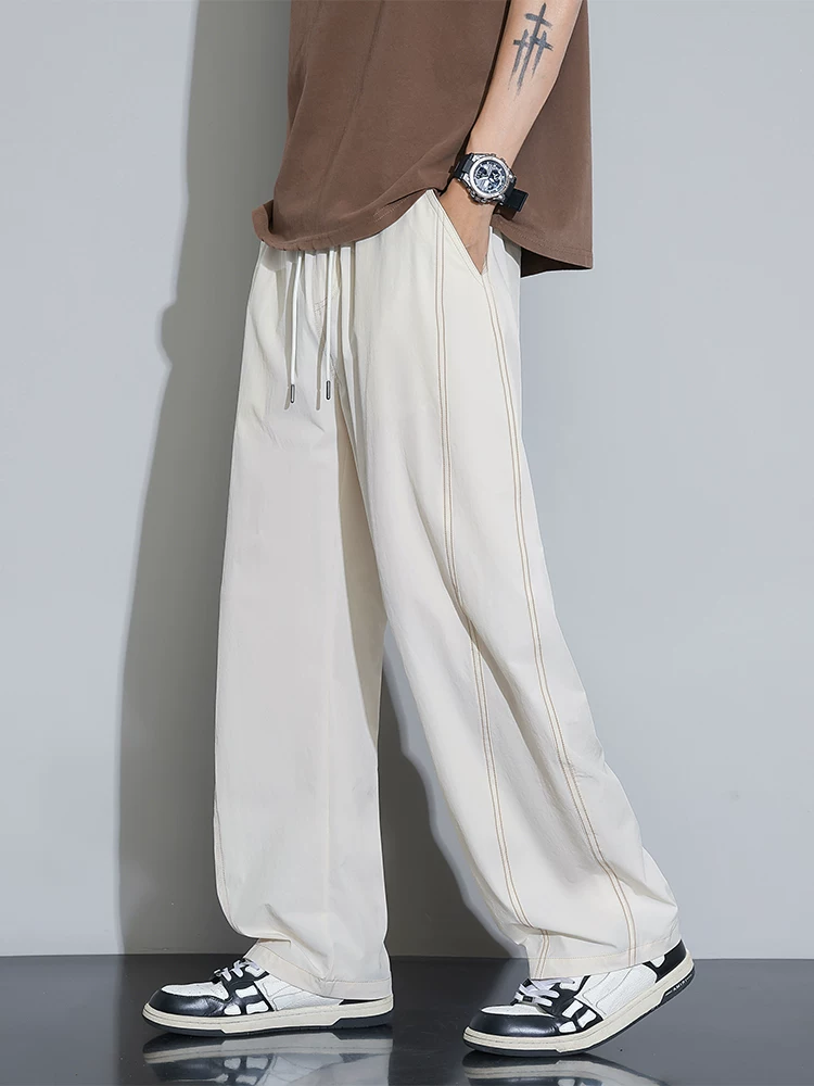 Quần âu nam Jeanswest phong cách Mỹ, mẫu mới hè 2026, dáng rộng, đa năng, quần thể thao ống đứng suông mềm mại.