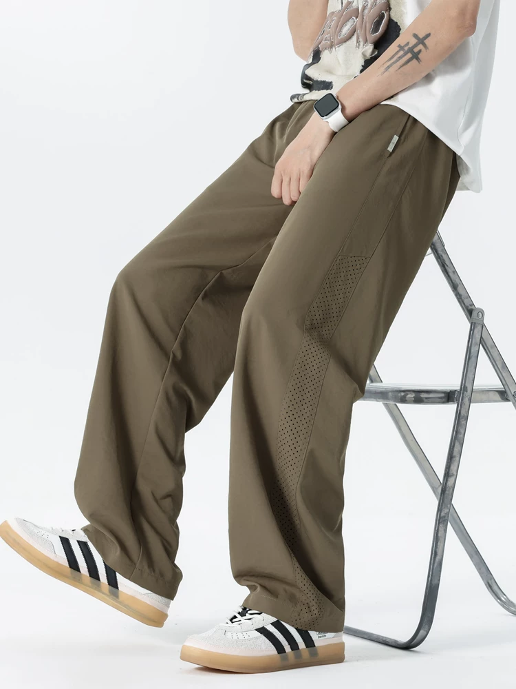 Quần nam Jeanswest mùa xuân thu dáng thẳng rộng rãi 2026 quần thể thao mới mùa hè quần thể thao nam thông thường