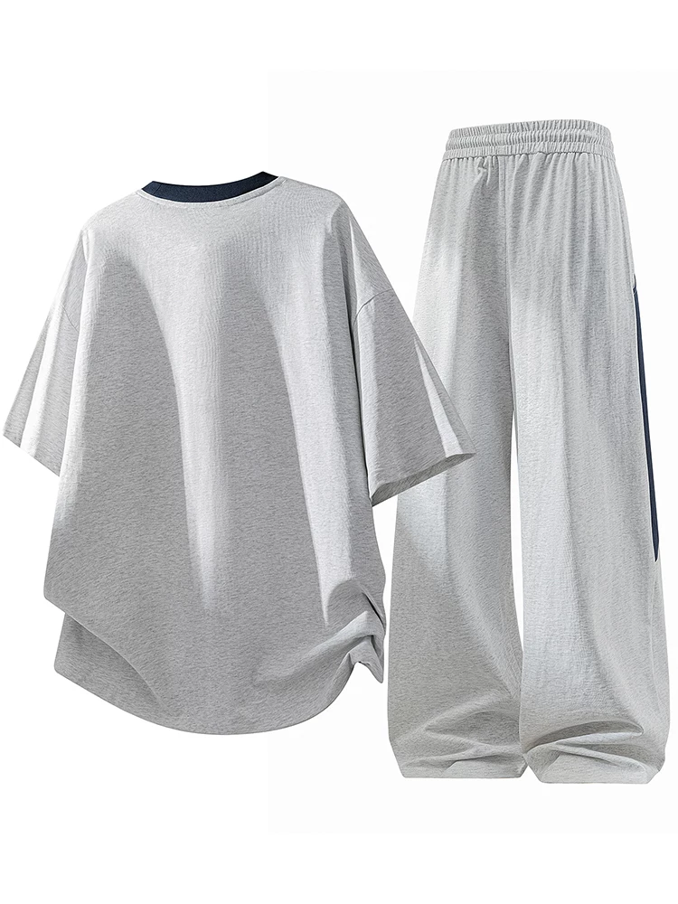 Bộ đồ thể thao cổ tròn phối màu phong cách Mỹ của Jeanswest dành cho nam, thương hiệu thời thượng cao cấp mùa hè, bộ hai mảnh mát mẻ và rộng rãi.