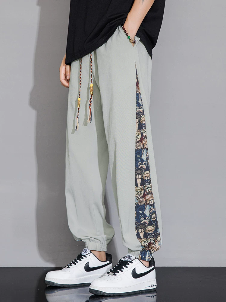 Quần jogger nam Jeanswest kiểu Mỹ thời trang, chất liệu lụa đá mỏng, mùa hè 2025, mới, thoáng khí, đa năng, dáng rộng, quần thể thao.