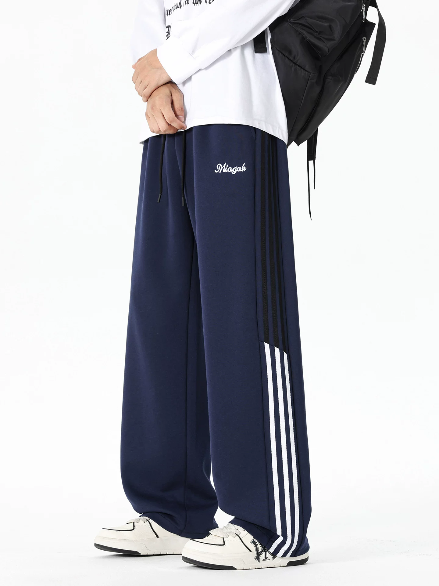 Quần thể thao ống đứng thời trang phong cách Mỹ của Jeanswest dành cho nam, dáng rộng thoải mái cho mùa xuân thu, quần dài trẻ trung.