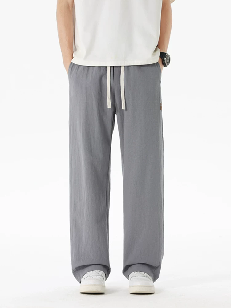 Quần jeanswest ống rộng thời trang phong cách Mỹ dành cho nam, mùa xuân thu, quần thể thao rộng rãi đa năng cao cấp.