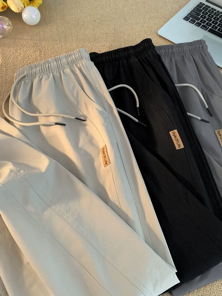 Quần ống đứng cao cấp phong cách tối giản kiểu Nhật của Jeanswest dành cho nam, quần ống rộng đa năng, chất liệu lụa băng mỏng, thoải mái, mặc mùa hè.