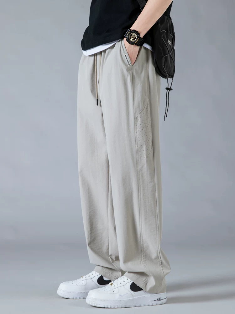 Quần dài nam Jeanswest chất liệu vải lưới tơ đá, nhanh khô, dáng thẳng, rộng rãi, phong cách Mỹ, thời trang, đa năng, ống rộng, thích hợp cho mùa hè.