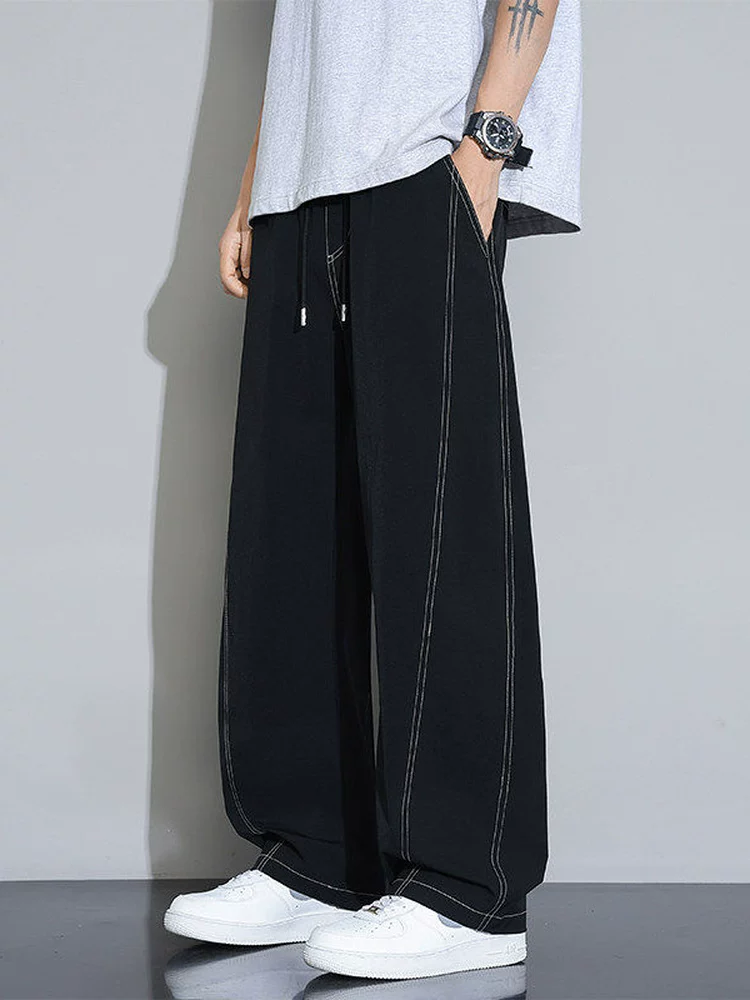 Quần âu nam Jeanswest phong cách Mỹ, mẫu mới hè 2026, dáng rộng, đa năng, quần thể thao ống đứng suông mềm mại.