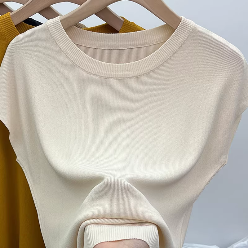 Thâm Quyến Nanyou quần áo nữ cao cấp phong cách châu Âu cắt nhãn độc đáo áo vest dệt kim cổ điển phong cách Pháp áo khoác ngoài không tay dáng rộng