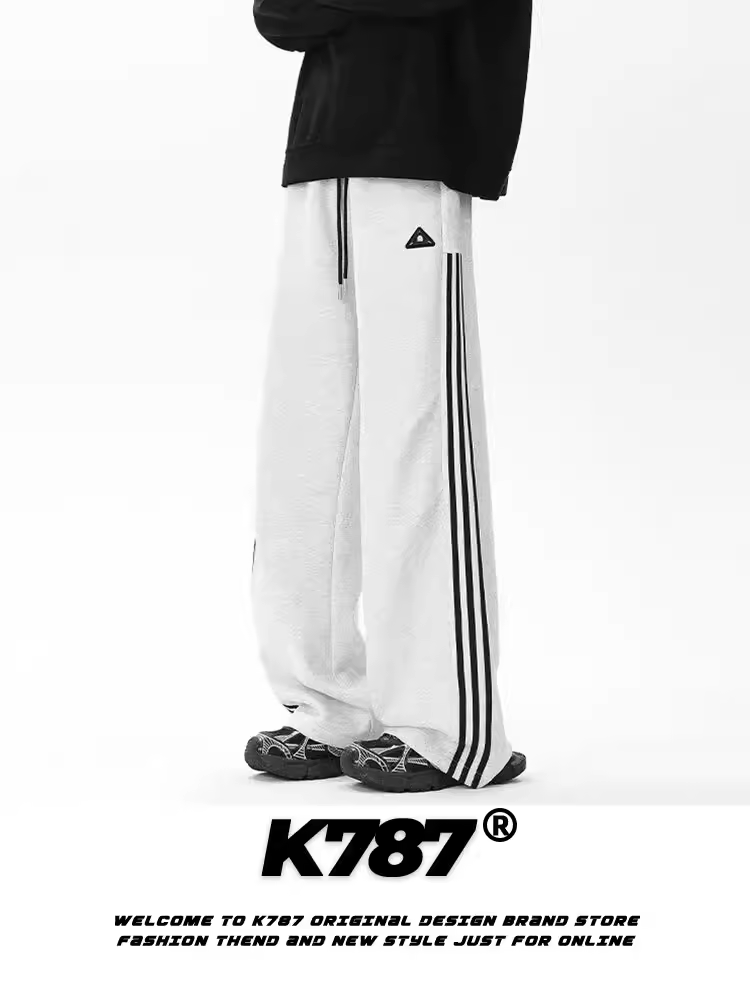 Quần thể thao nam K787 kiểu Mỹ cổ điển, ba sọc, chất liệu vải dù, cạp cao, dây rút, dáng rộng, đa năng, thích hợp khiêu vũ đường phố