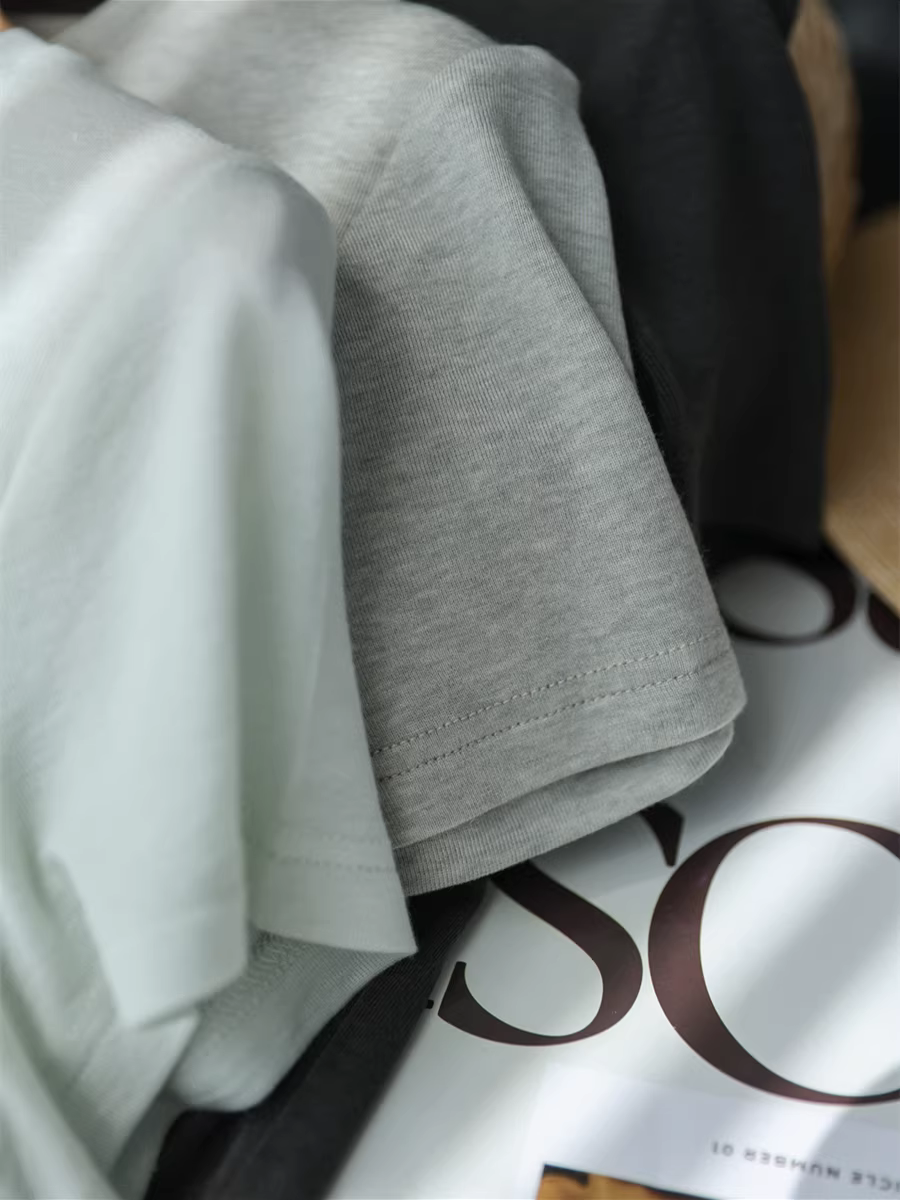 76% Lyocell + 19% len cừu! Áo thun nữ siêu mềm mại và đa năng, cổ tròn mùa hè, vai thường, tay ngắn màu trơn cơ bản.