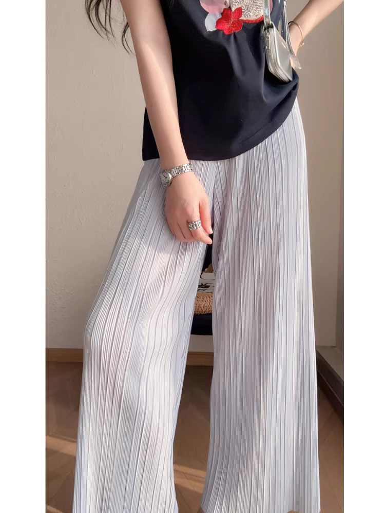 Quần xếp ly kiểu Miyake, vải xếp ly lụa bóng một mảnh, quần ống rộng cạp cao dáng thẳng tôn dáng cho nữ, mới cho mùa hè