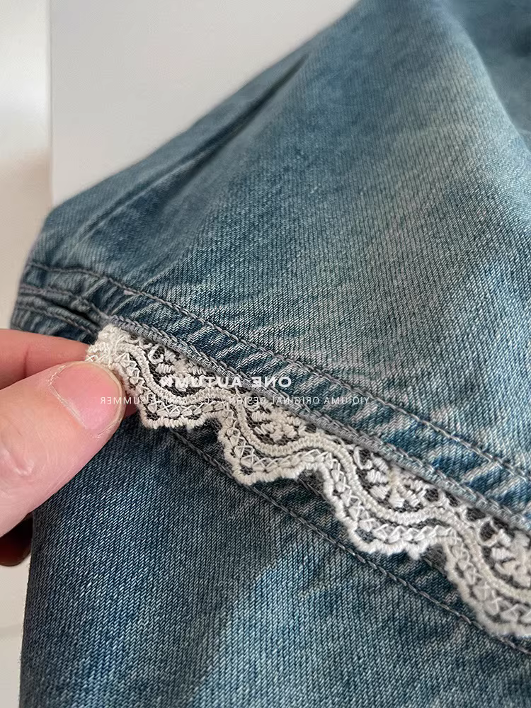 Quần jean phối ren rách cho bé gái 25 xuân hè dáng rộng vừa và lớn quần dài thẳng thường ngày đa năng cho trẻ em