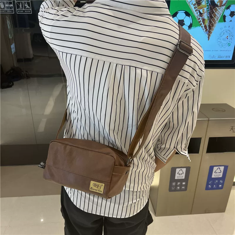 Ba hộp túi vuông nhỏ thời trang dành cho nam, túi đeo chéo nhỏ một vai thương hiệu thời thượng Hàn Quốc và Nhật Bản, ba lô đeo chéo cổ điển giản dị dành cho nam và nữ.