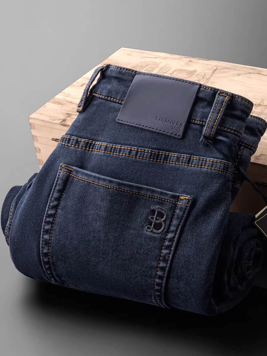 Quần jean nam thu đông mới, màu xanh đậm, chất liệu vải tuýt, dáng thẳng rộng, lót chải mềm, đã qua xử lý làm mềm, co giãn, kiểu dày dặn.