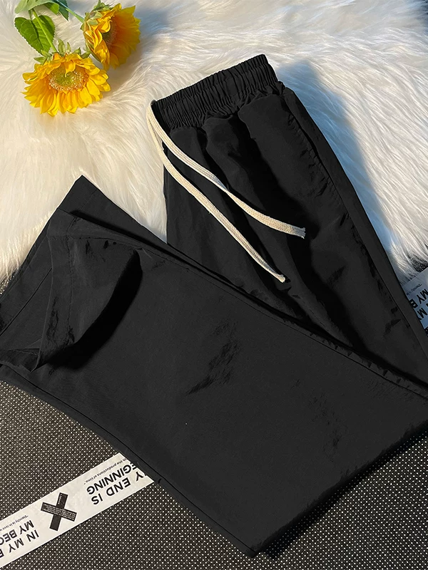Quần dài mùa hè mỏng, nhanh khô, kiểu dáng thường ngày dành cho nam, dáng rộng, hơi loe, phong cách thời thượng, quần dù thể thao đường phố.