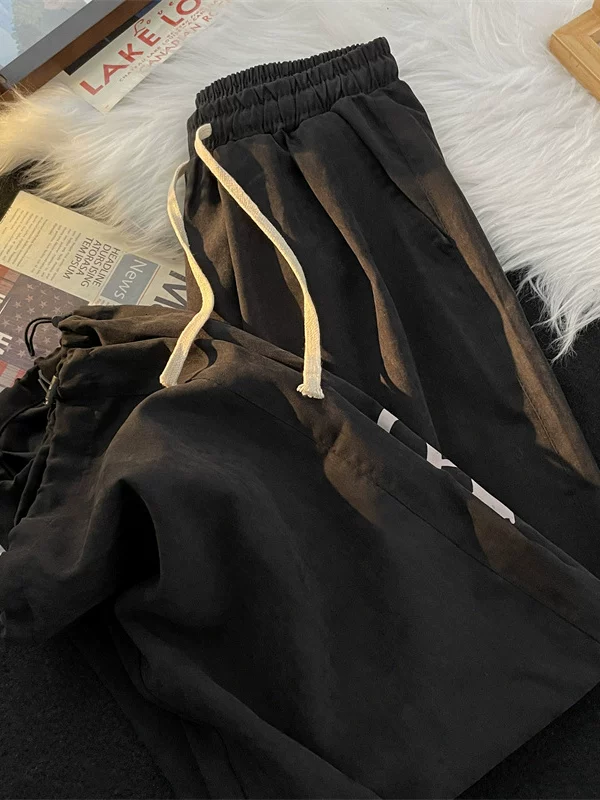 Quần da lộn nam, quần thể thao mỏng mùa hè, quần jogger in họa tiết thời trang cao cấp.