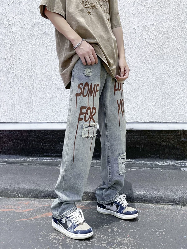 Quần jean rách in họa tiết phong cách đường phố Mỹ dành cho nam, dáng rộng ống thẳng, quần hip-hop hợp thời trang mùa hè dành cho giới trẻ.