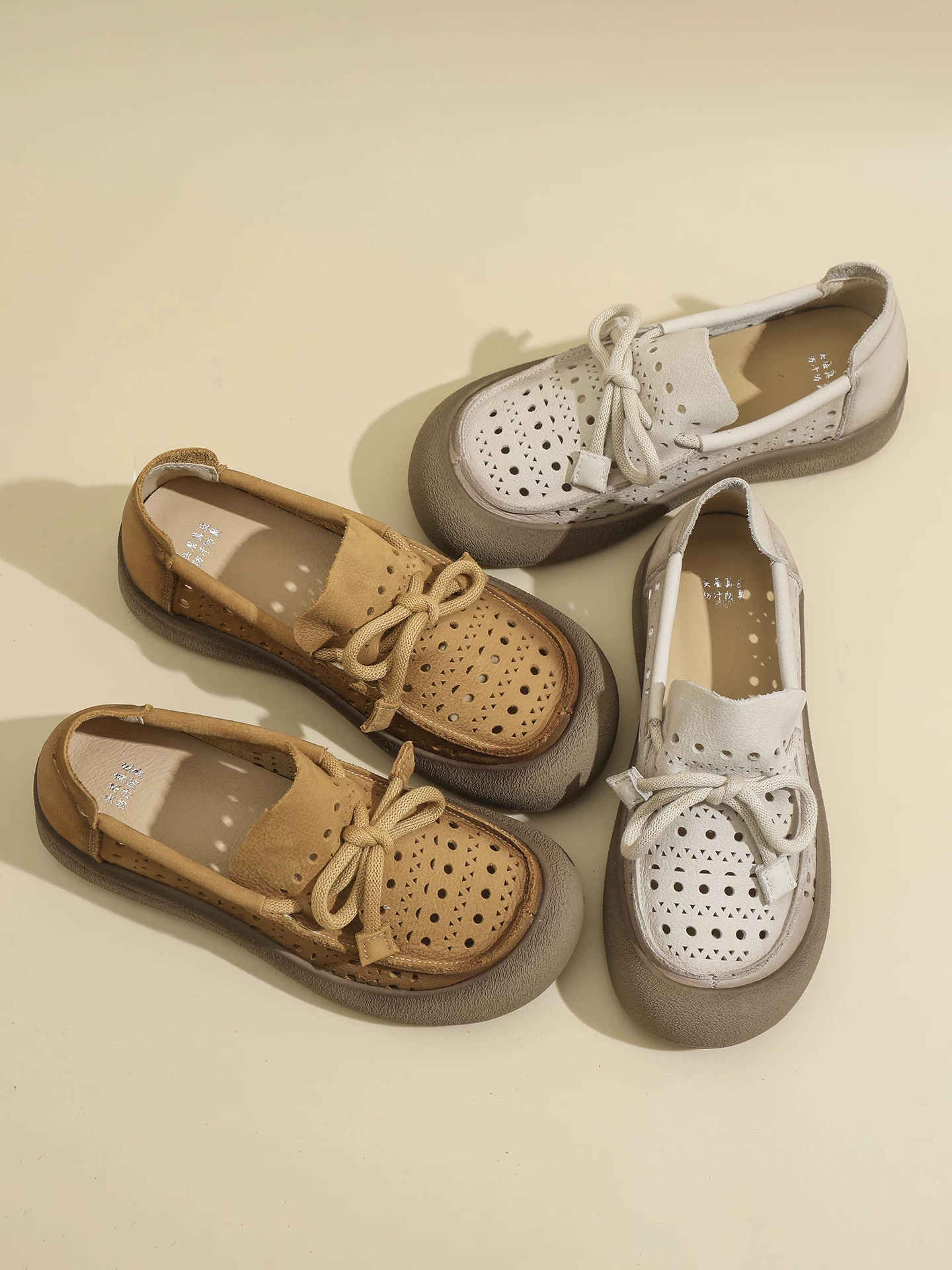 Giày sandal nữ da thật khoét lỗ, mũi kín, kiểu dáng xu hướng mới xuân hè 2026, giày lười đế mềm thoáng khí.
