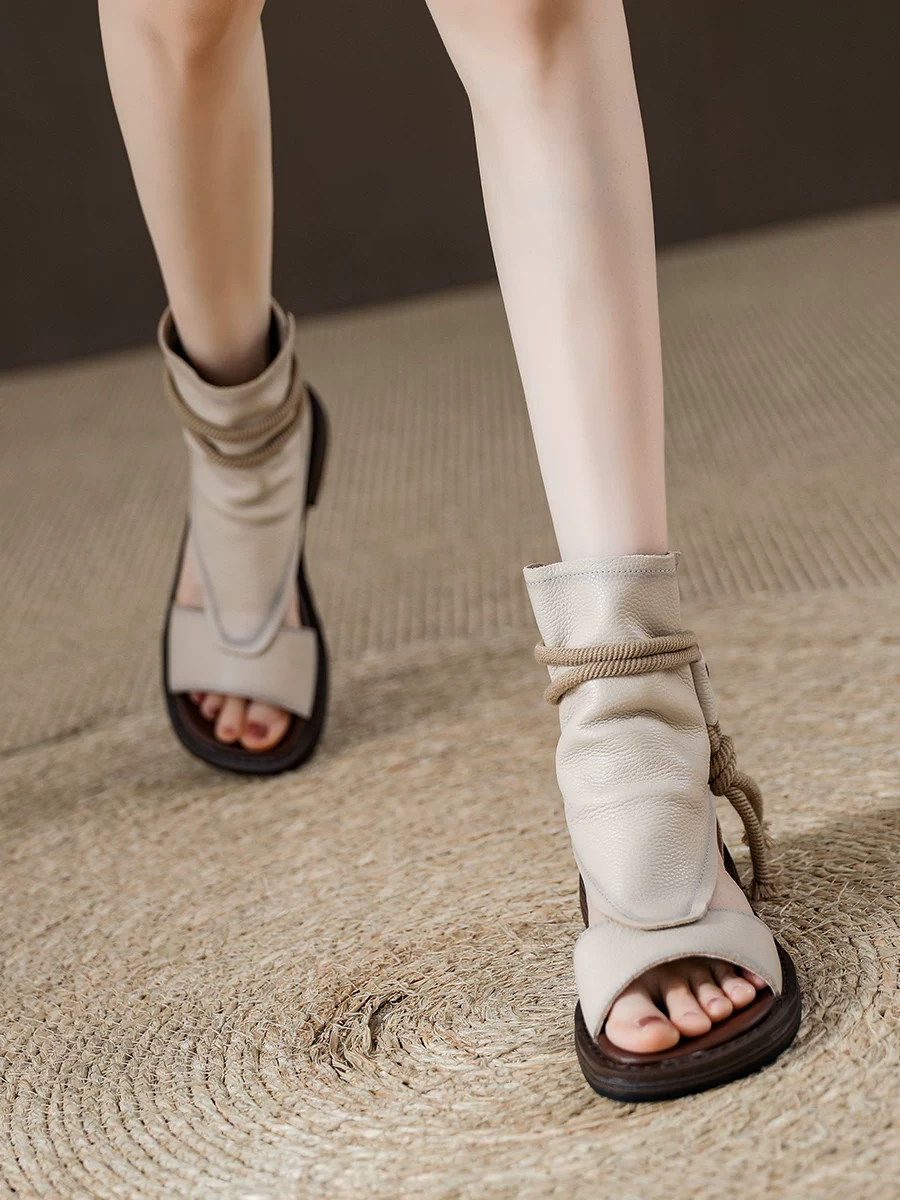 Giày sandal La Mã cổ điển bằng da thật dành cho nữ, giày sandal cao cổ hở mũi thông thường, phong cách mới mùa hè 2026, bốt ngắn thoáng khí khoét lỗ.