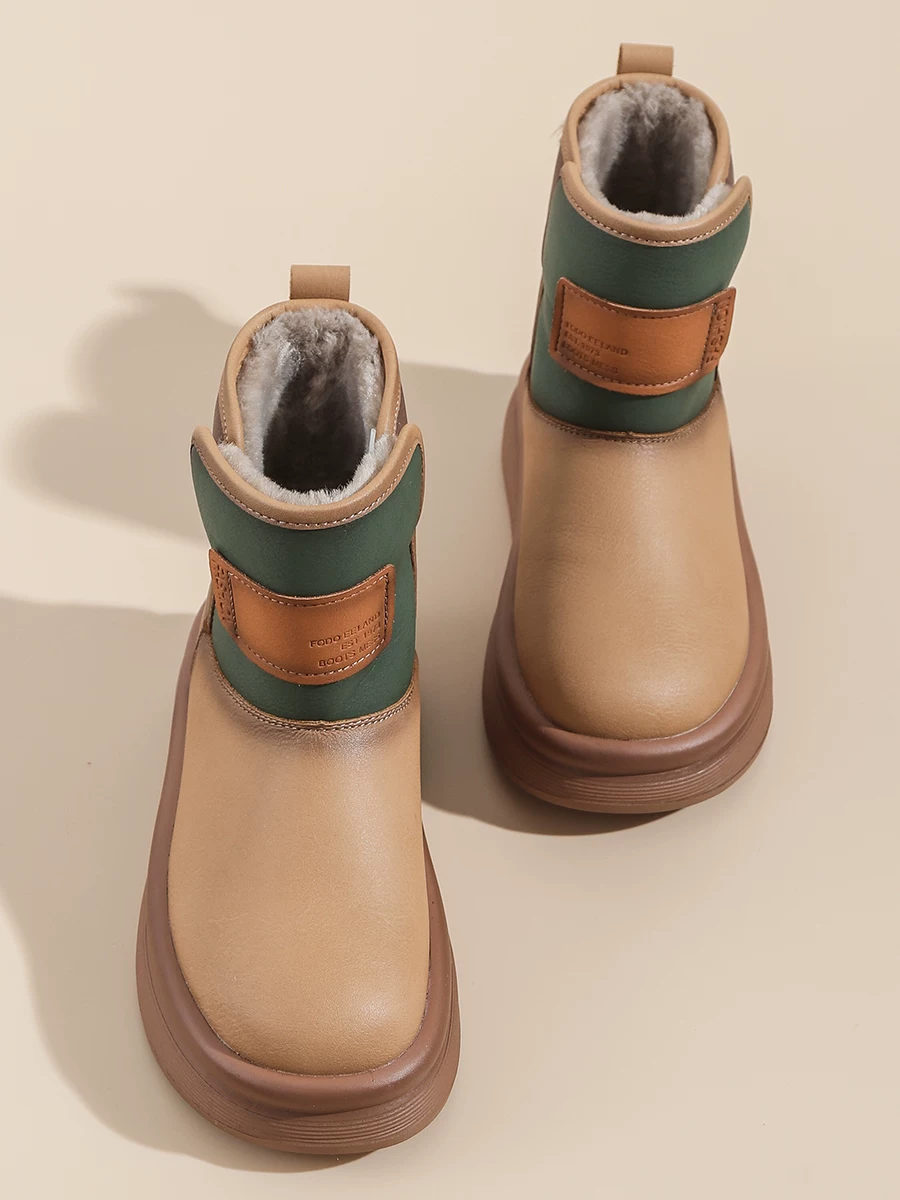 Giày bốt tuyết retro nữ, chất liệu da và lông tích hợp, bốt ngắn dày dặn, mẫu mới 2025, chống thấm nước, chống trơn trượt, lót bông ấm áp.