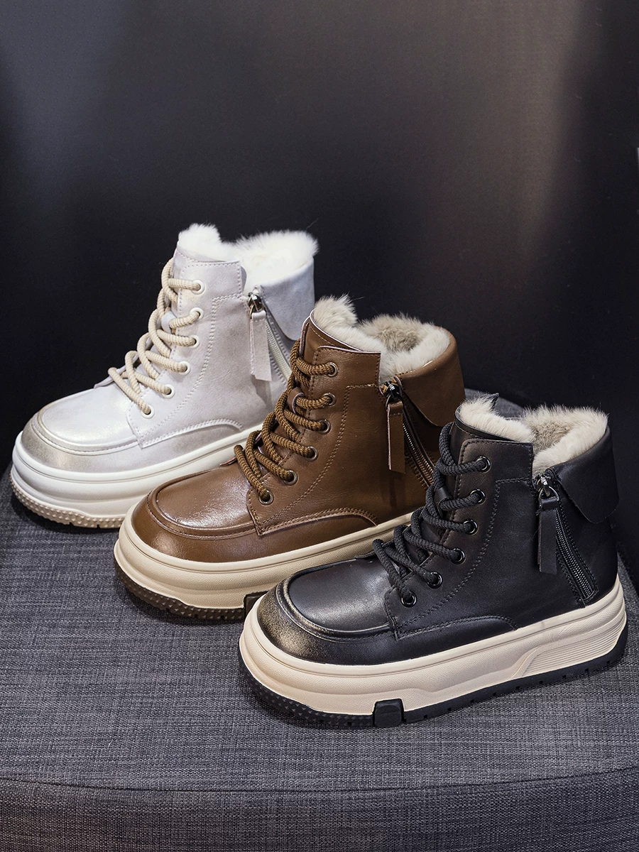 Giày bốt tuyết đế dày bằng da thật dành cho nữ, lót lông cừu và giày cotton cổ cao dày dặn, kiểu mới mùa đông 2025, bốt ngắn lông thú phong cách thể thao năng động.