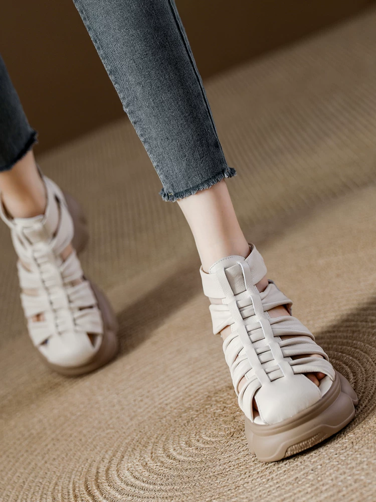 Dép da thật kiểu retro dành cho nữ, giày đế dày khoét lỗ, giày La Mã đế mềm mùa hè mới 2026 dành cho nữ.