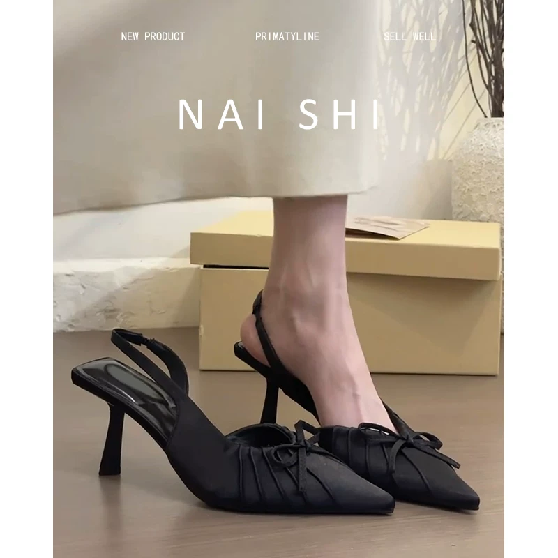 Phiên bản da cừu! Dép sandal nữ kiểu Pháp màu đen, mũi kín, có nơ, khoét bên, gót cao, giày mũi nhọn gợi cảm.