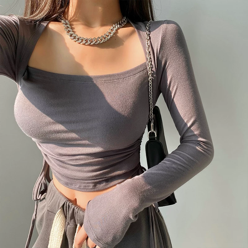 YoungGirlDay Pure Desire Gợi cảm Slim Fit lệch vai lộ xương đòn Dây rút bên hông Áo thun dài tay dành cho nữ.