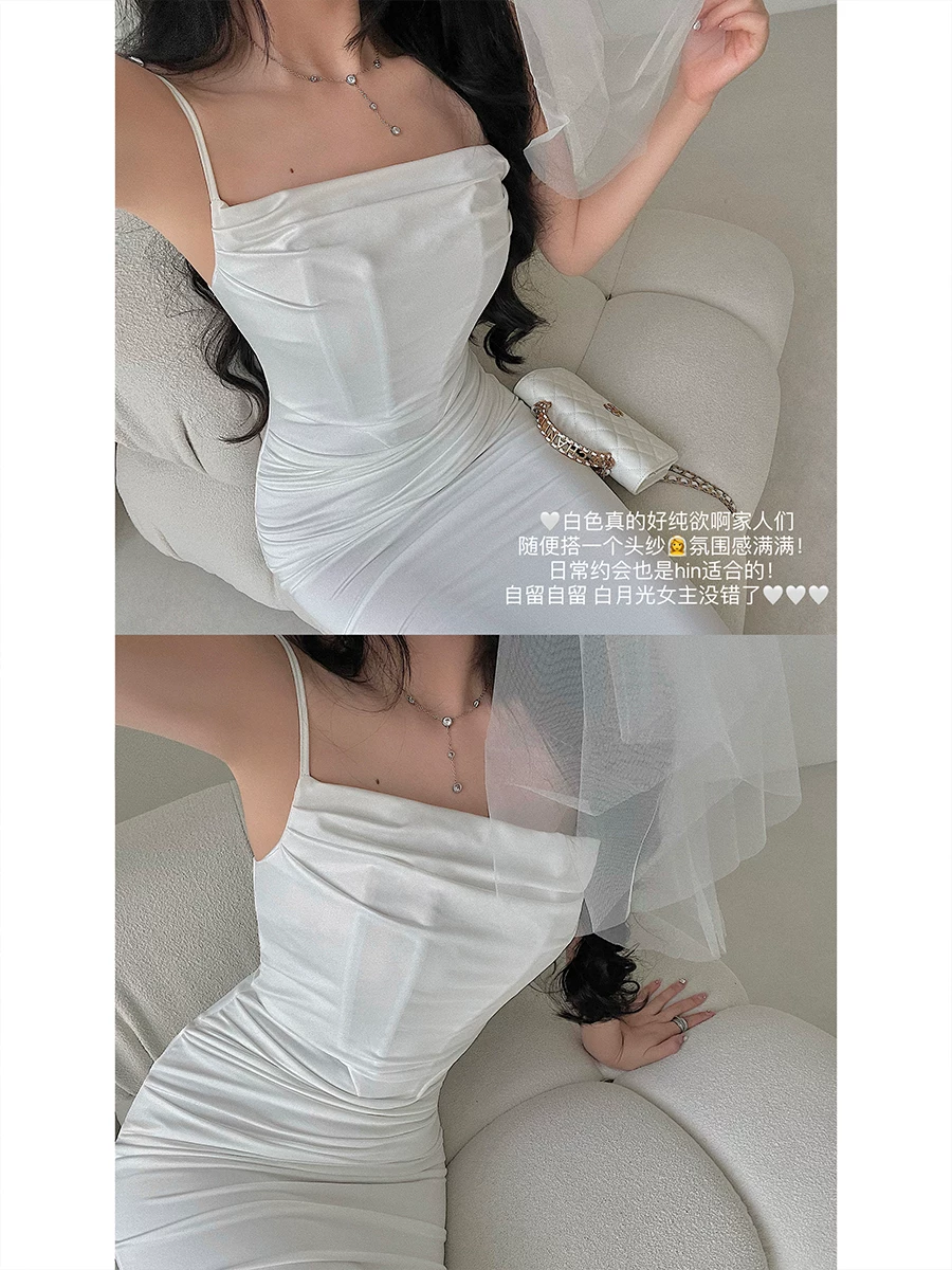 Váy liền thân ôm sát dáng đuôi cá, thiết kế xếp ly, chất liệu thon gọn, kiểu dáng gợi cảm của YoungGirlDay Kardashian.