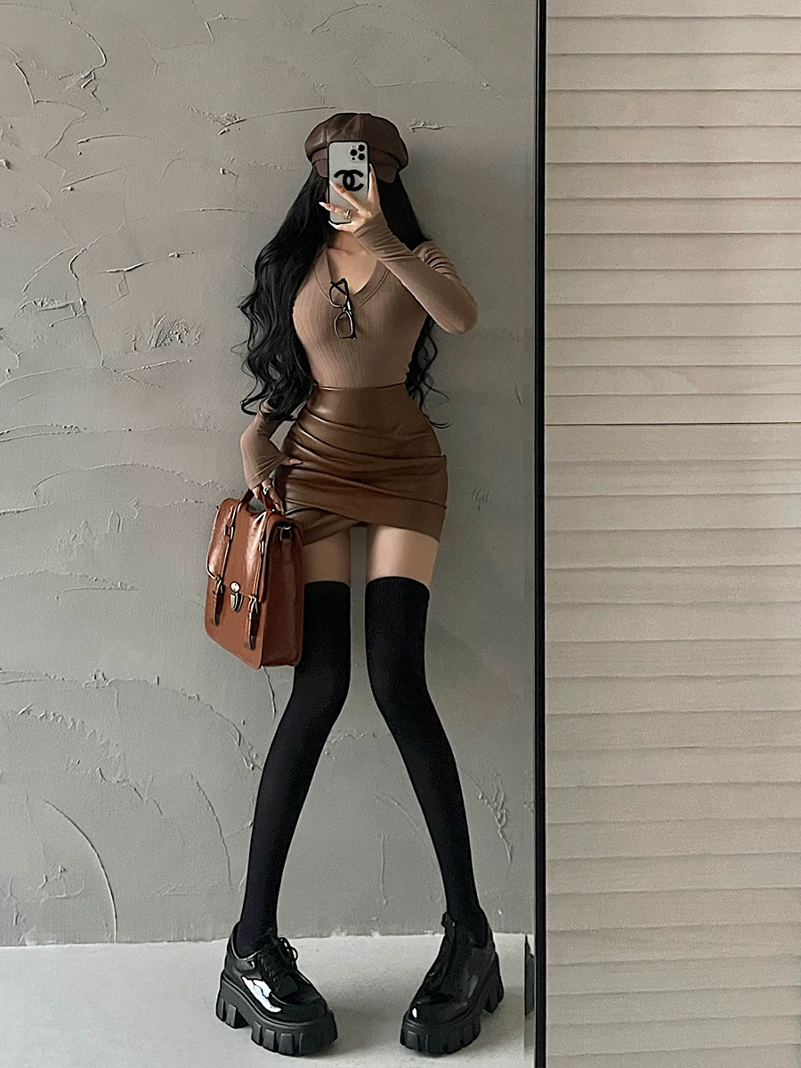 YoungGirlDay khao khát thuần khiết hot girl gợi cảm eo cao giảm béo chống lộ hàng xếp ly váy ngắn bằng da PU.