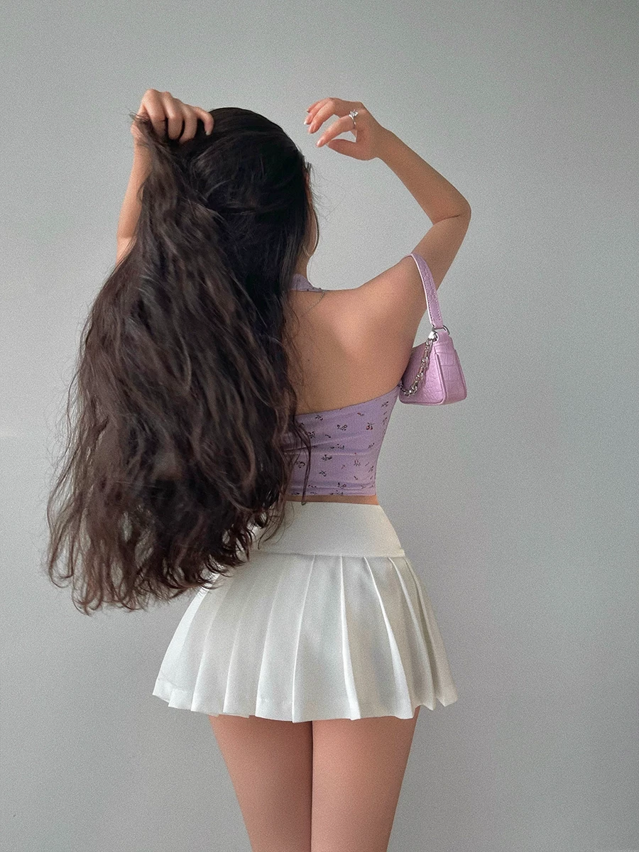 YoungGirlDay áo ba lỗ cổ yếm hai lớp họa tiết hoa ngắn, ôm sát, hở lưng gợi cảm