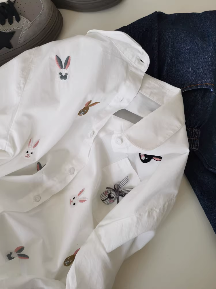 Áo sơ mi thêu trắng dài tay, dáng rộng, trang trí ba chiều, mặc thường ngày cho nữ mùa xuân