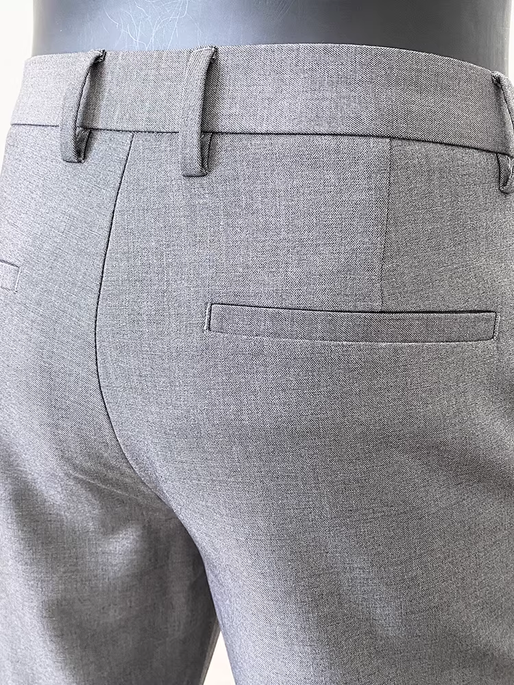 Quần âu nam chất liệu len và lyocell, kiểu dáng thời trang thu đông 2025, ôm dáng, ống côn, lịch lãm.