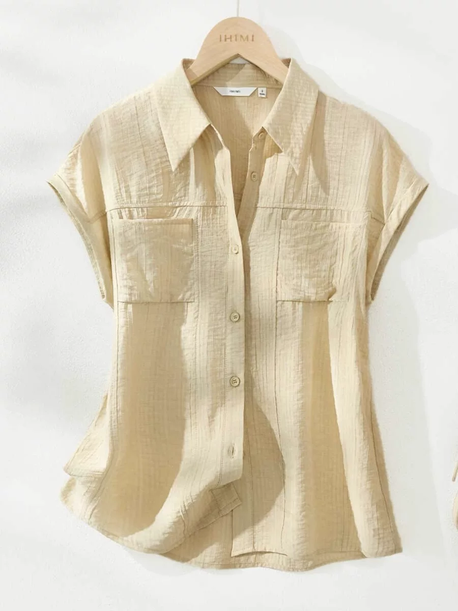 Áo sơ mi thời trang Hàn Quốc nữ hè 2026 chất liệu cotton linen, dáng rộng, size lớn, ôm dáng, tay ngắn, đơn giản, hợp xu hướng.