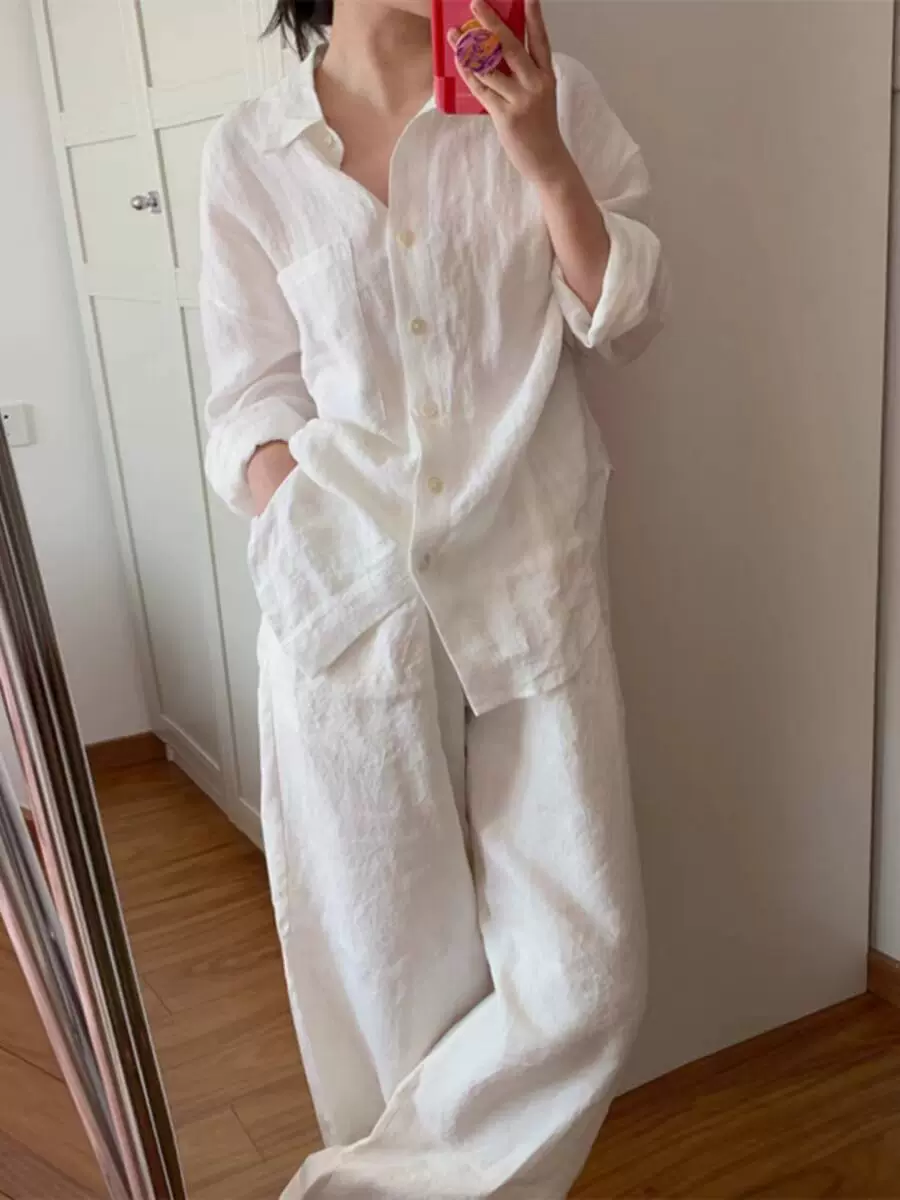 Bộ đồ nữ chất liệu cotton và lanh trắng, kiểu mới thu 2026, phong cách đơn giản, thoải mái, phóng khoáng, áo sơ mi rộng rãi và quần dài, bộ hai món đa năng.