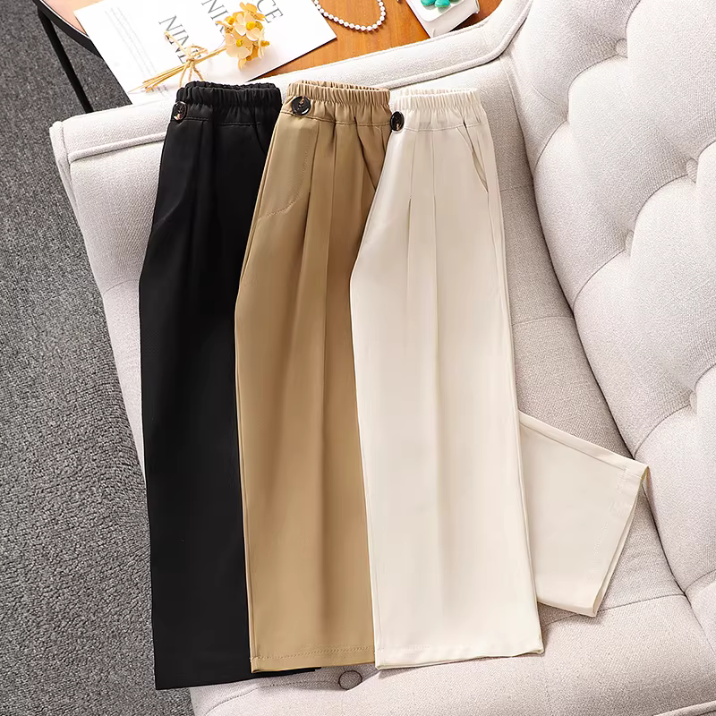 Quần đen nữ bé gái kiểu mới 2025, quần ống rộng dáng suông chất liệu vải lụa đá mát mẻ mùa hè dành cho bé gái lớn