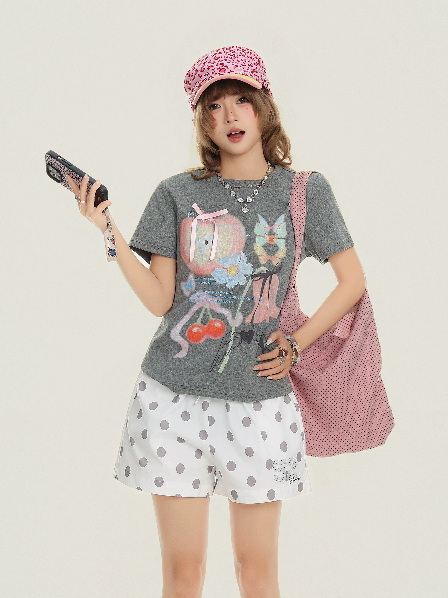 Áo thun ngắn tay thiết kế Bulu Biscuit Retro Graffiti Bowknot dành cho nữ, áo thun dáng rộng mùa hè giúp giảm béo.