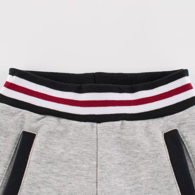 Quần dài trẻ em phong cách Hàn Quốc mùa xuân đông mẫu mới quần thể thao bé trai quần lót lông cừu quần trẻ em quần dài dày lót lông cừu cho bé