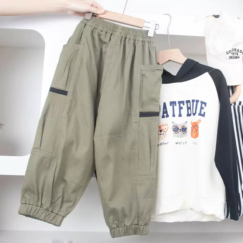 Quần cargo túi lớn cho bé trai, quần cotton dệt thông thường, kiểu dáng xuân thu mới, quần dài rộng rãi cho trẻ lớn, kiểu dáng thời thượng.