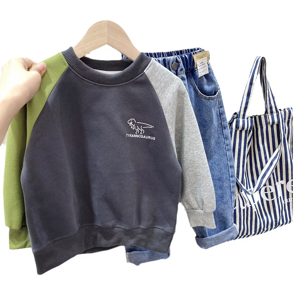 Áo thun bé trai 2025 mẫu xuân mới áo dài tay in hình khủng long áo thun bé trai size trung và lớn áo thun cổ tròn