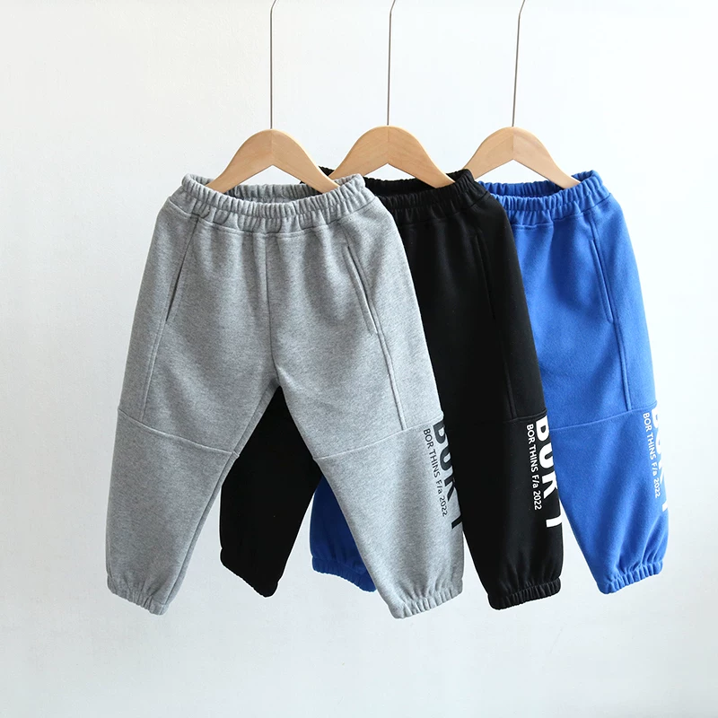 Quần thể thao trẻ em xuân thu 2025 kiểu Hàn Quốc mới, quần jogger cotton nguyên chất thời trang cho bé trai và bé gái