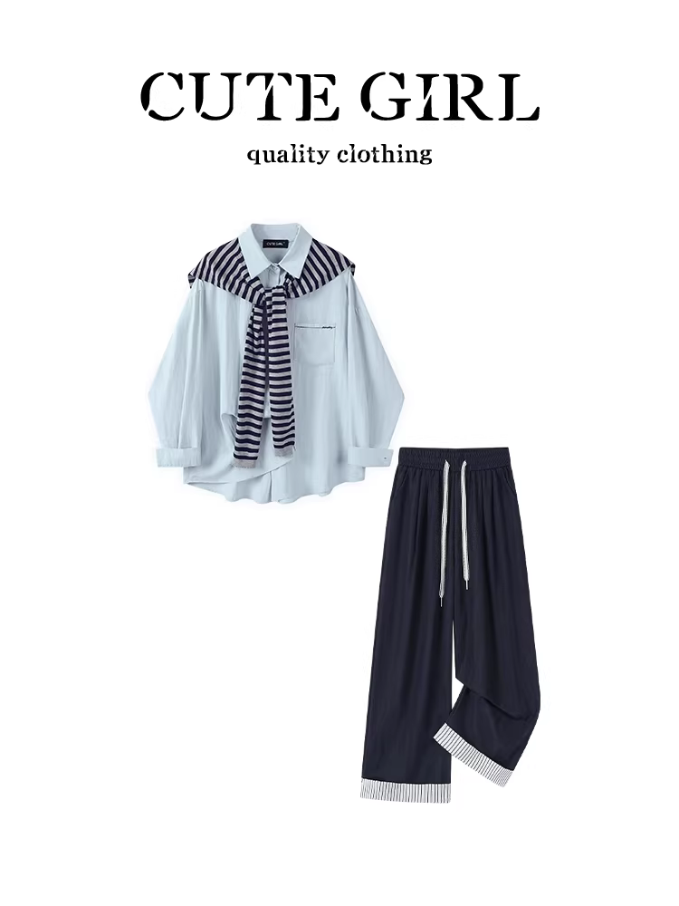 Trang phục phong cách thoải mái của CuteGirl: Bộ trang phục hoàn chỉnh gồm áo sơ mi xanh nữ có khăn choàng, quần ống rộng lưng thun, kiểu dáng giản dị.