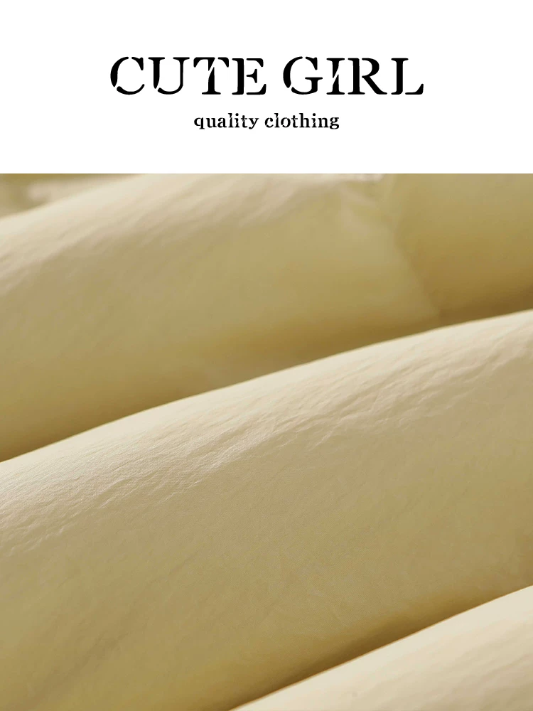 Áo khoác ngắn cổ đứng màu vàng kem phong cách dễ thương dành cho nữ trong mùa thu đông, áo khoác cotton rộng rãi và đa năng dành cho người có vóc dáng nhỏ nhắn.