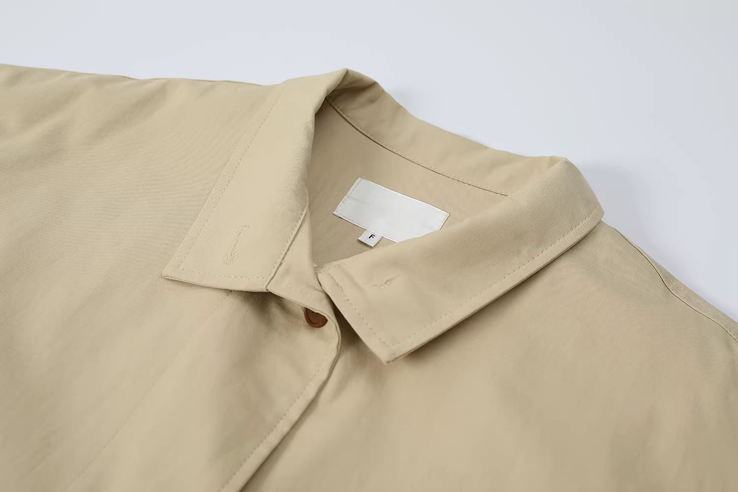 Áo khoác trench coat nữ dáng nhỏ xinh CuteGirl mùa xuân thu 2025 kiểu Hồng Kông cổ điển, dáng rộng, dài trung bình