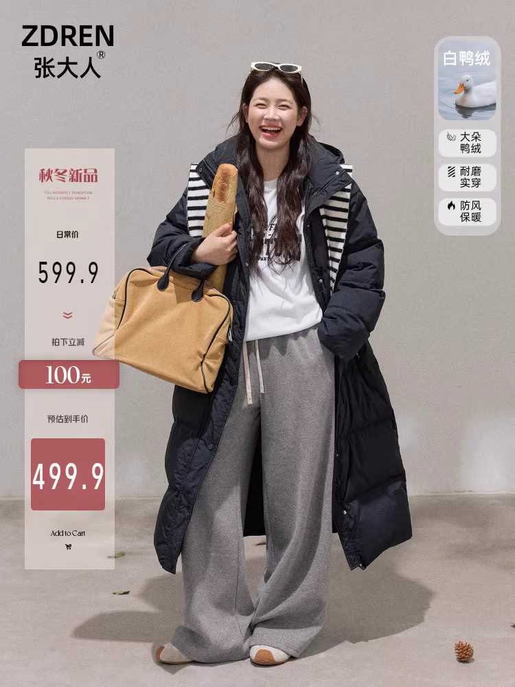 Quần áo nữ cỡ lớn mới của Zhang Daren dành cho những cô gái mũm mĩm, áo khoác dài màu đen có mũ trùm đầu kiểu Hàn Quốc giúp giảm béo cho mùa đông.