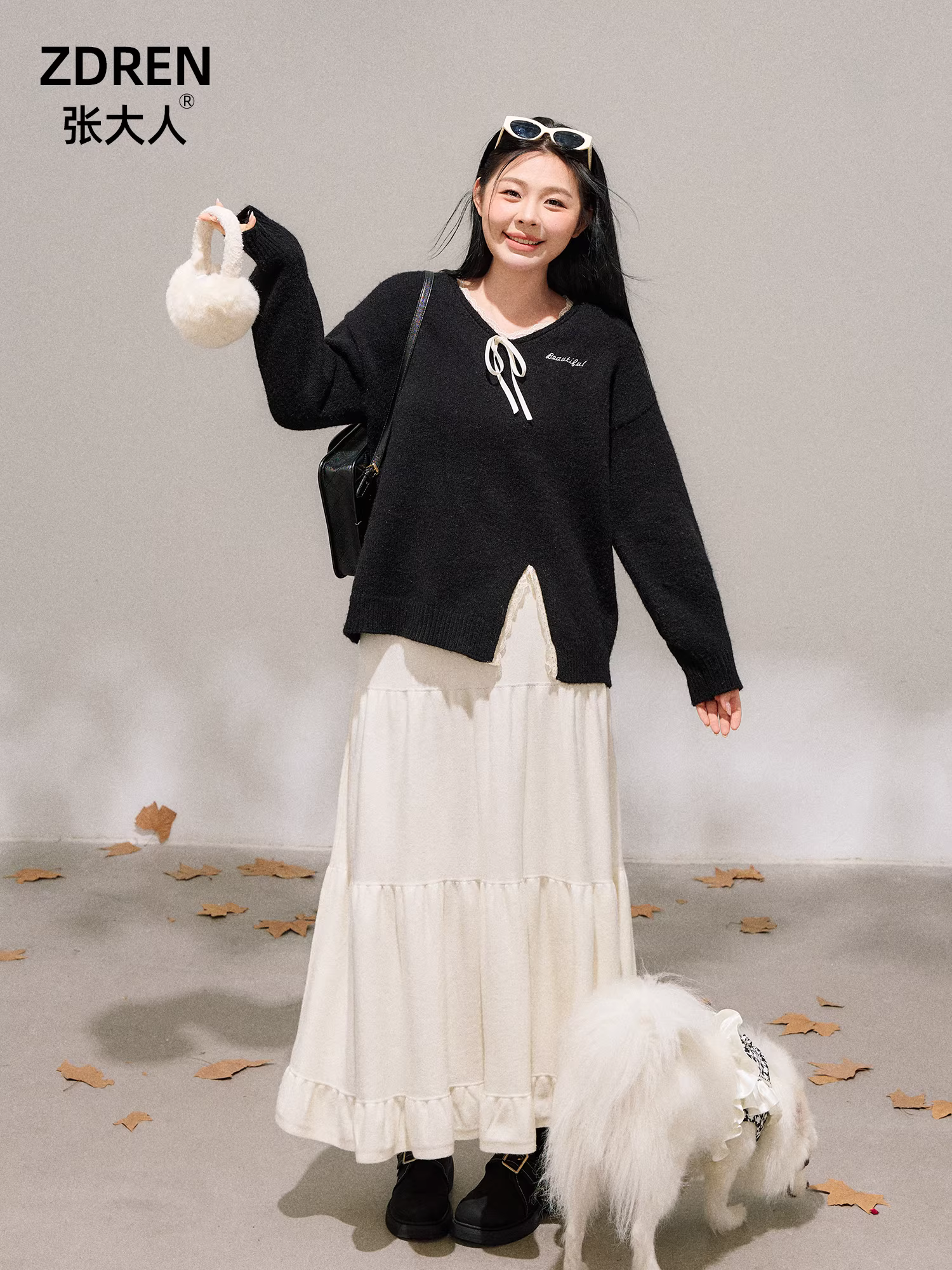 Bộ quần áo nữ cỡ lớn dành cho người lớn, kiểu Hàn Quốc, áo len đen cổ ren tôn dáng và chân váy trắng lưng cao.