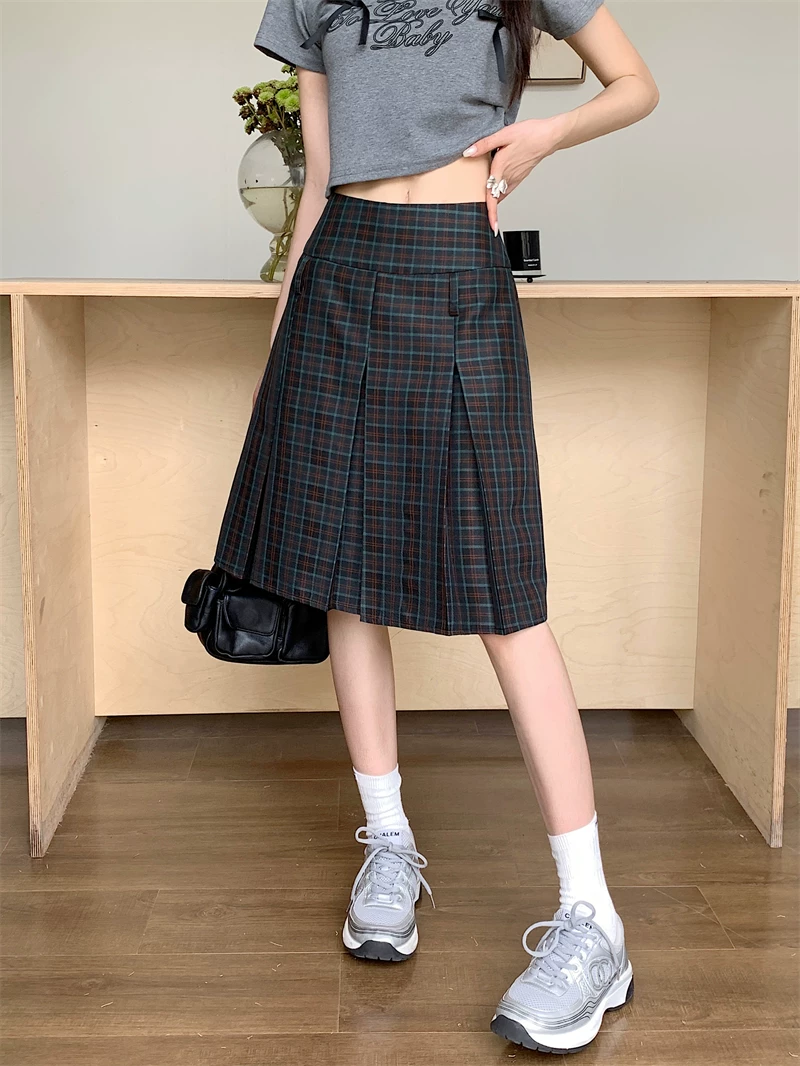 Váy xếp ly kẻ sọc cổ điển kiểu Mỹ, váy ngắn chữ A cỡ lớn dành cho nữ, váy kiểu học sinh cạp cao dành cho phụ nữ nhỏ nhắn.