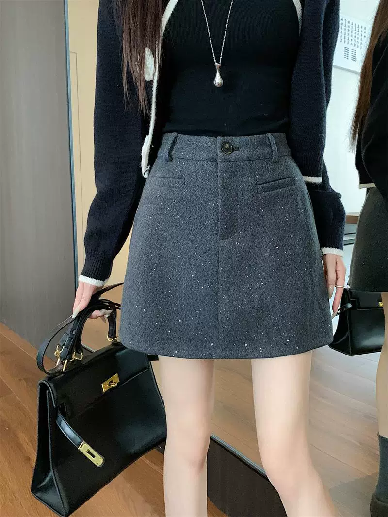 Váy ngắn len sáng bóng bầu trời sao cho nữ, mùa thu đông, cỡ lớn, váy chữ A lưng cao, váy ngắn ôm sát đính sequin nhỏ nhắn.
